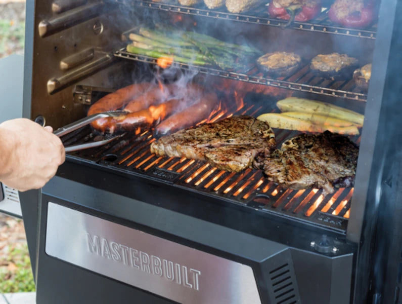 Sausages, steaks, asparagus, stuffed mushrooms and more cook on a Gravity Series grill.
