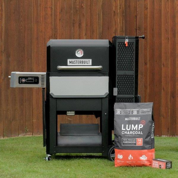 Gravity Series Grill with bag of lump charcoal and box of firestarters