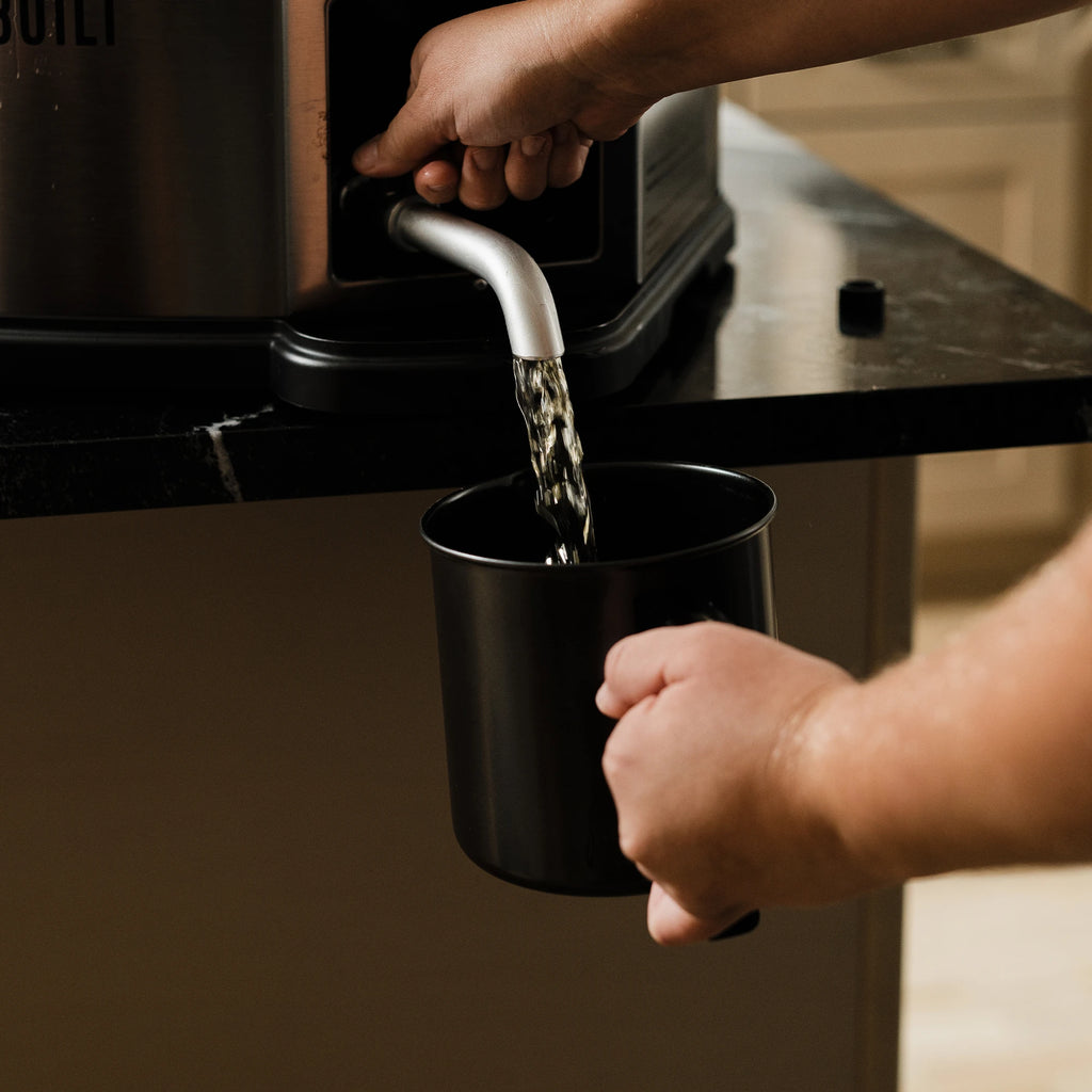 Bottom liquid spout makes draining water or oil easy