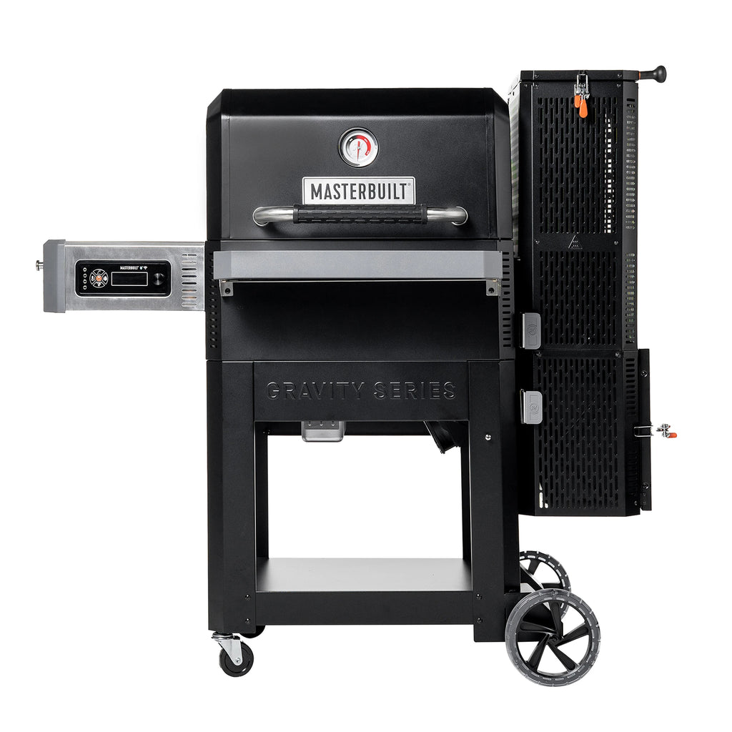The Masterbuilt Gravity Series 900 Digital Charcoal Grill and Smoker on a white background. The grill is mounted on a wheeled cart with a solid metal shelf between the legs. The charcoal hopper is to the right of the grill and the control panel is mounted under the side shelf to the left.
