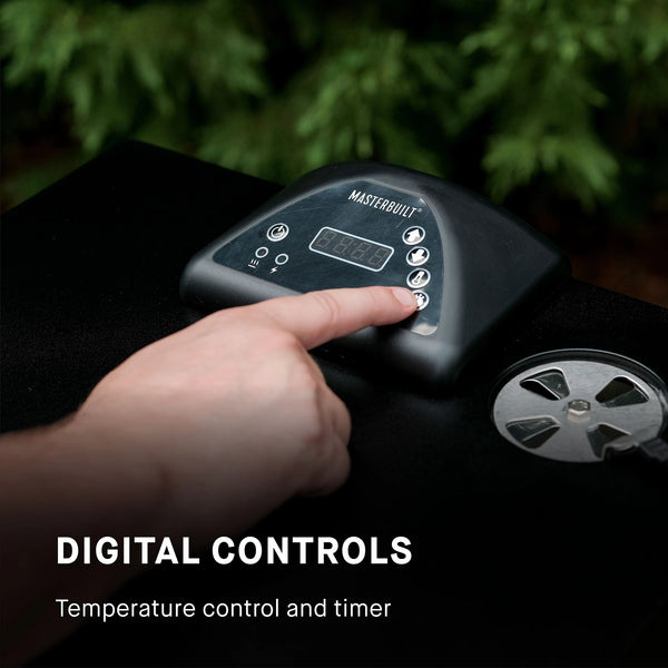 Hand pressing digital controls on a smoker with Masterbuilt branding, surrounded by greenery. Digital controls have temperature control and timer.