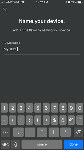 Phone screen with keyboard and text "Name your device"
