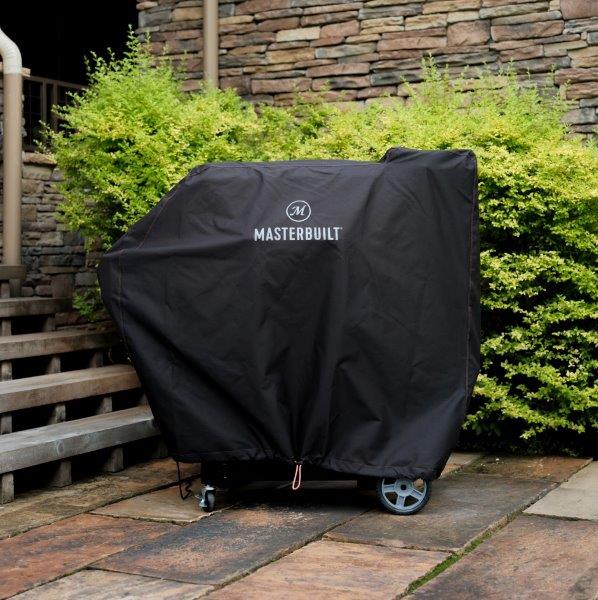 Gravity Series 800 Digital Charcoal Griddle + Grill + Smoker under cover outdoors on patio