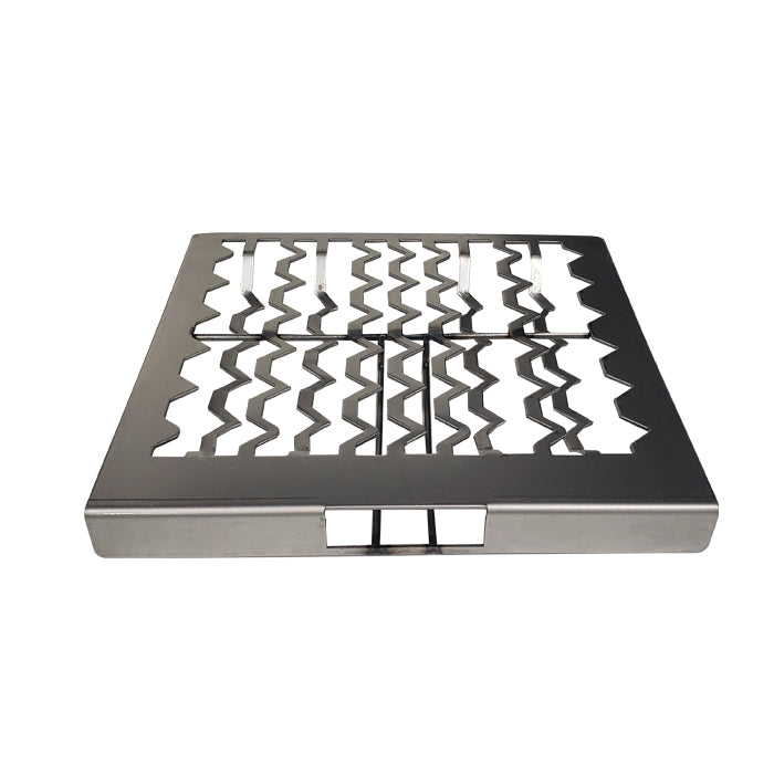 Top of charcoal grate showing top and side cutouts
