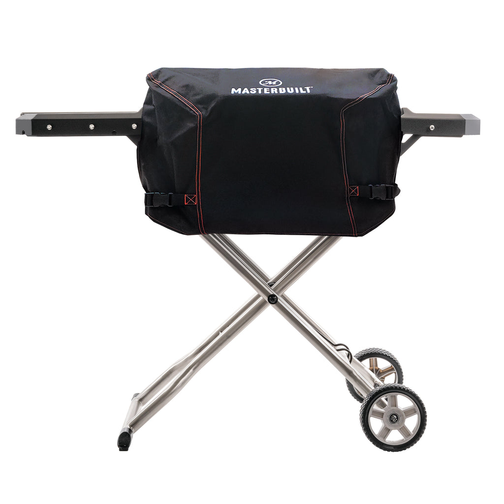 Grill cover on grill with cart and shelf