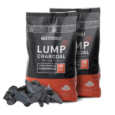 2 16 pound bags of Masterbuilt lump charcoal sit behind a small pile of lump charcoal