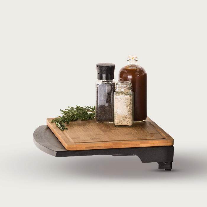 Side shelf holding cutting board and condiments