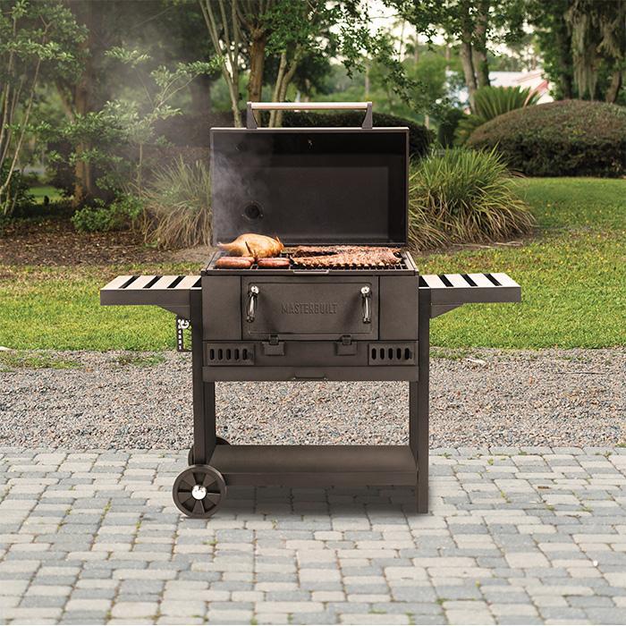 30" charcoal grill cooking ribs, chicken and hot dogs
