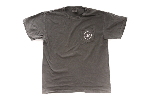 Dark grey, short sleeved t-shirt with breast pocket that has the Masterbuilt logo printed on it in white