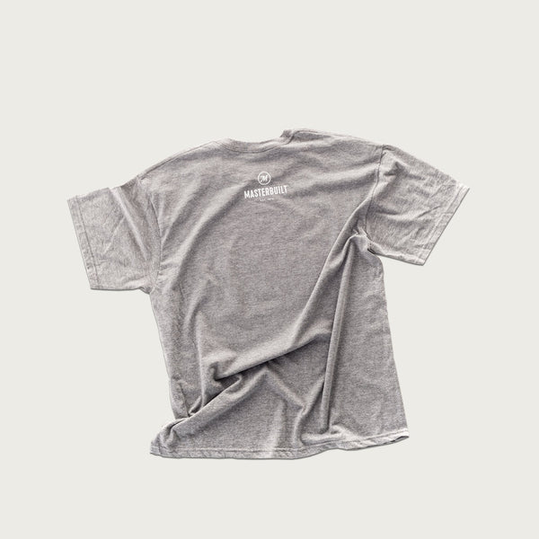 The back of the shirt has the Masterbuilt name and logo printed in white, centered just under the neck